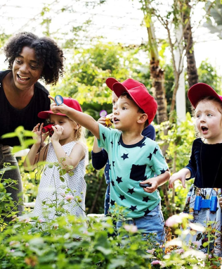 Image of teacher with kids